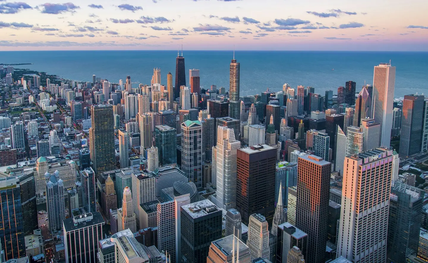 Aerial view of a city skyline at dusk